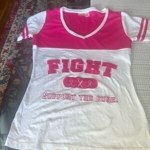 Hit pink cancer fighter’s top
